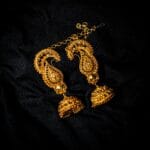 Traditional gold jhumka earrings jewellery design in Raichur